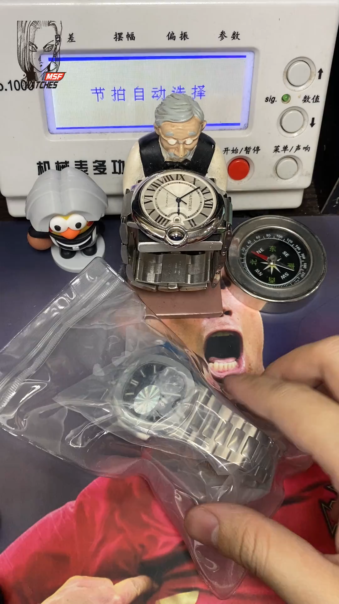 Patek Philippe Nautilus series 57121A-001, Blue Dial Steel Bracelet, Synchronized Functions, 40mm size.