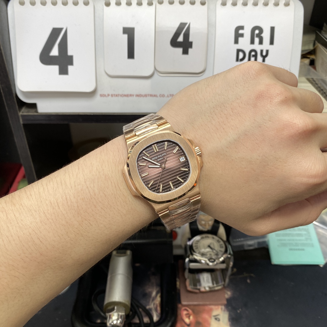 Patek Philippe Nautilus series 57111R-001, Coffee Dial Rose Gold Case Steel Bracelet, 40mm size.