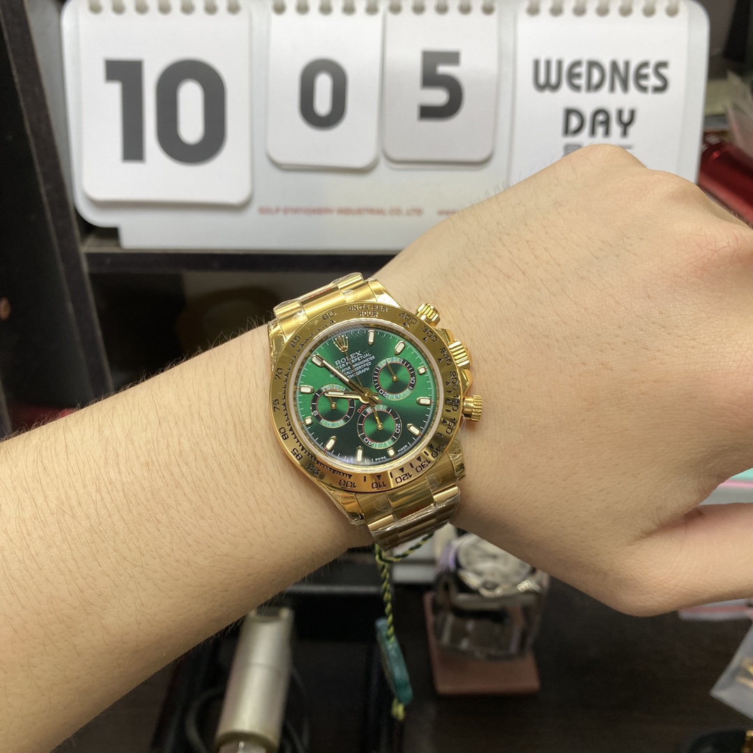 Rolex Cosmograph Daytona series m116508-0013, gold case green dial, 40mm size.