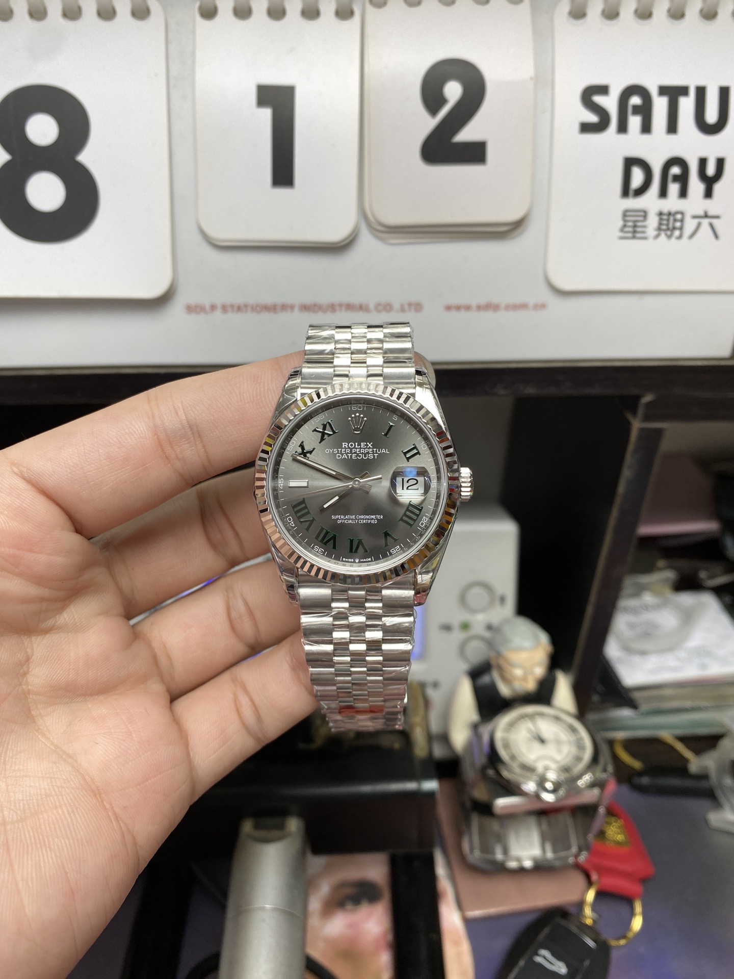 Rolex Datejust series m126234-0045, Green Roman Numerals on a Green Dial, 36mm size.