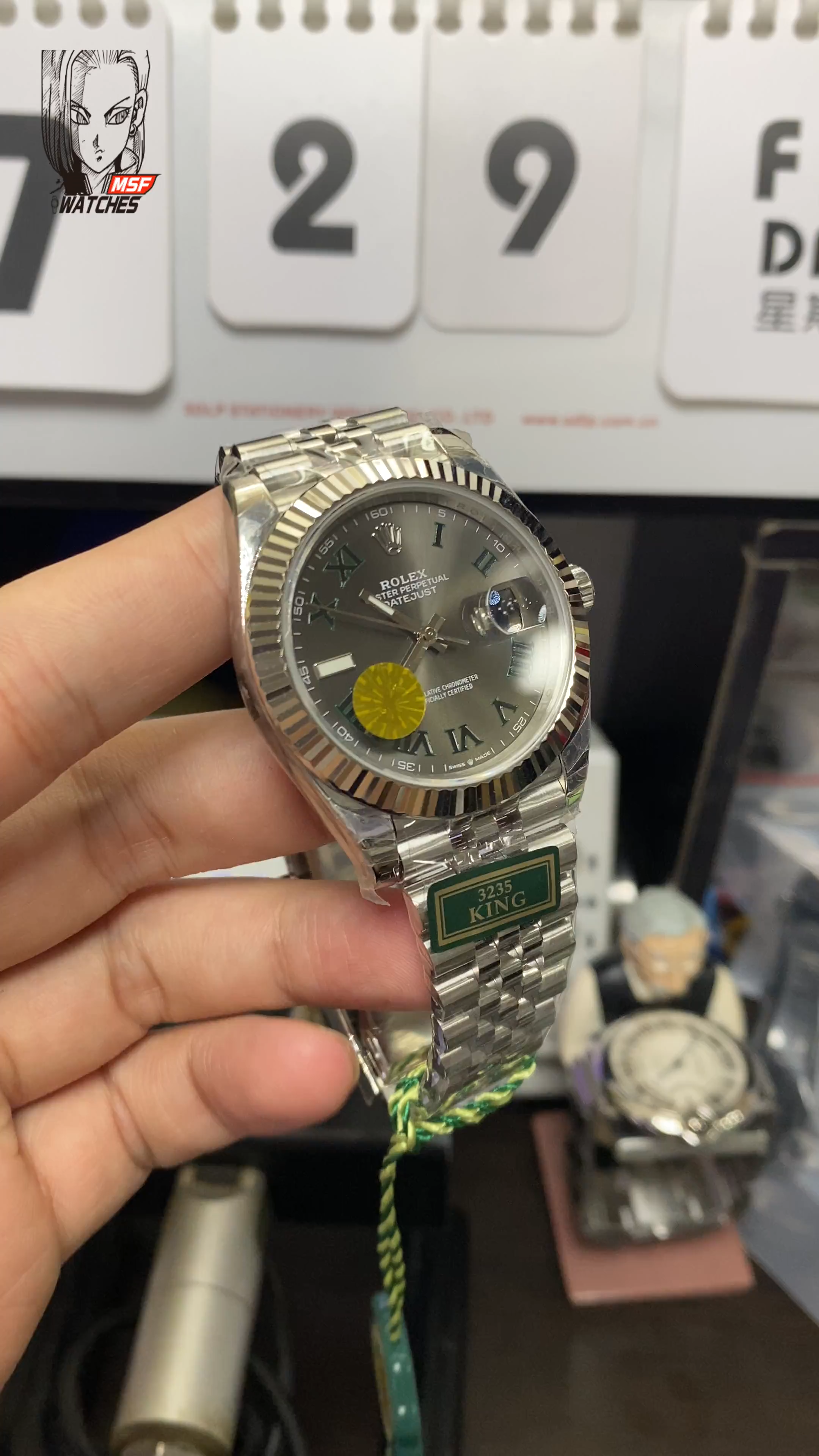 Rolex Datejust Series m126334-0022, Grey Dial with Green Roman Numerals Five-Link Stainless Steel Bracele, 41mm Size.