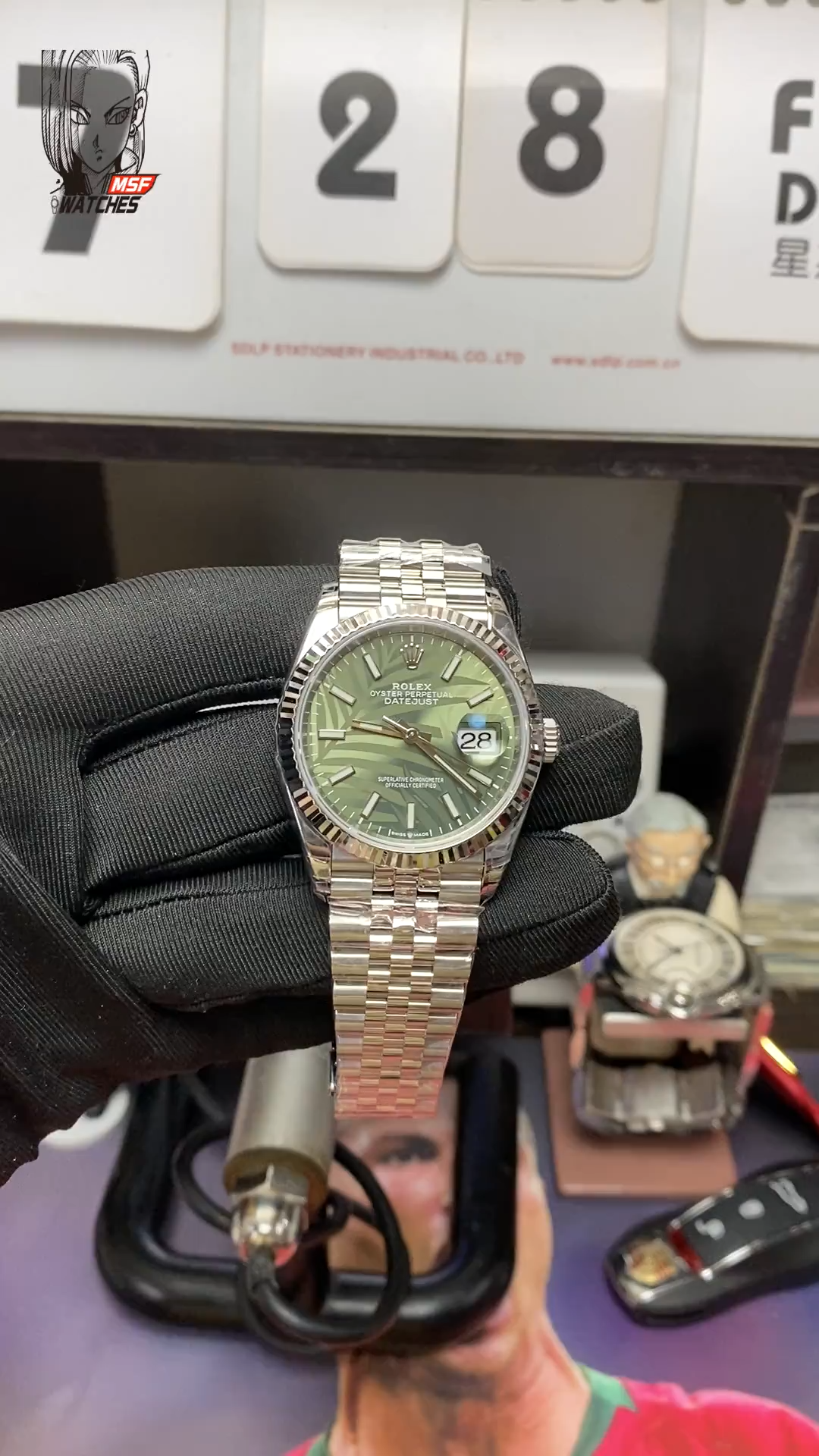 Rolex Datejust series m126234-0047, Palm Leaf Pattern on a Green Dial, 36mm size, Jubilee stainless steel bracelet.