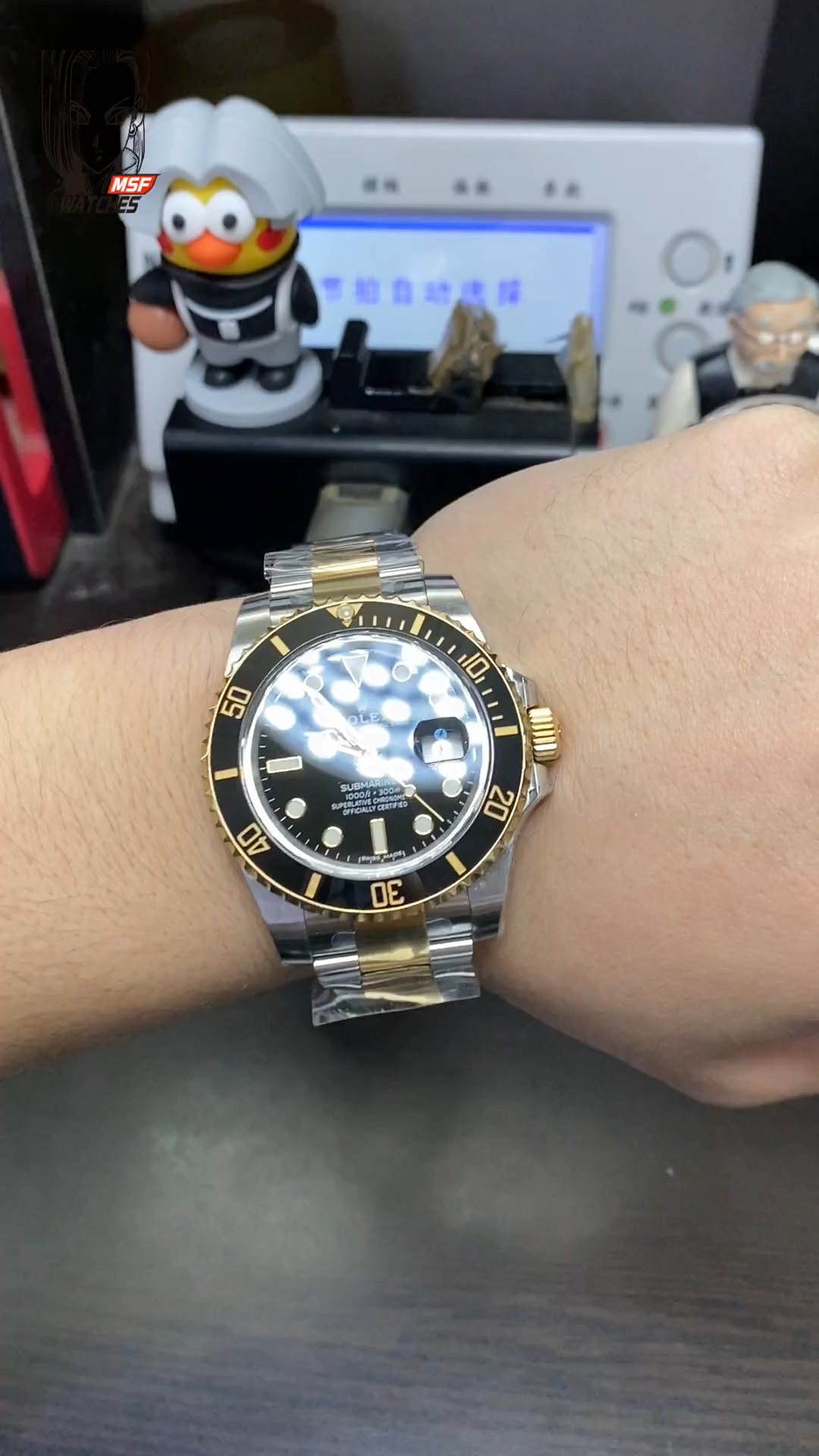 Rolex Submariner Series 116613LN-0001, Two-Tone Black Submariner, 40mm size.