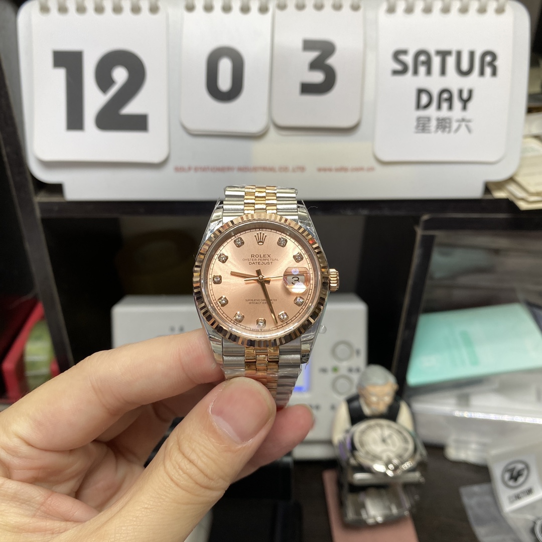 Rolex Datejust Series m126331-0008, Pink Dial with Checkered Bezel Two-Tone Rose Gold Case, 36mm Size, Five-Link Steel Bracelet.