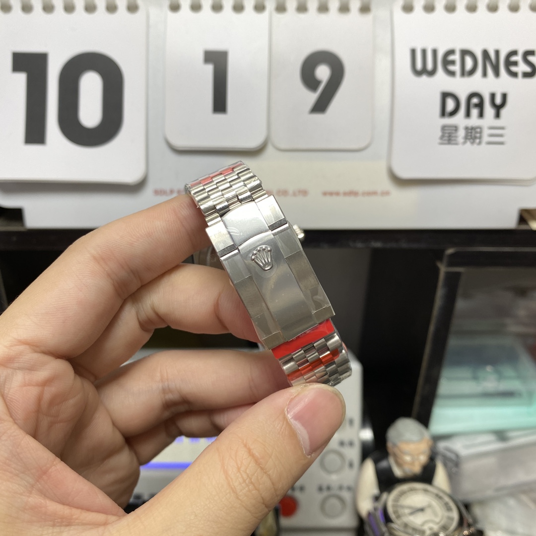 Rolex Datejust Series m126200-0003, Black Dial with Fluted Bezel and Five-link Bracelet, 36mm Size.