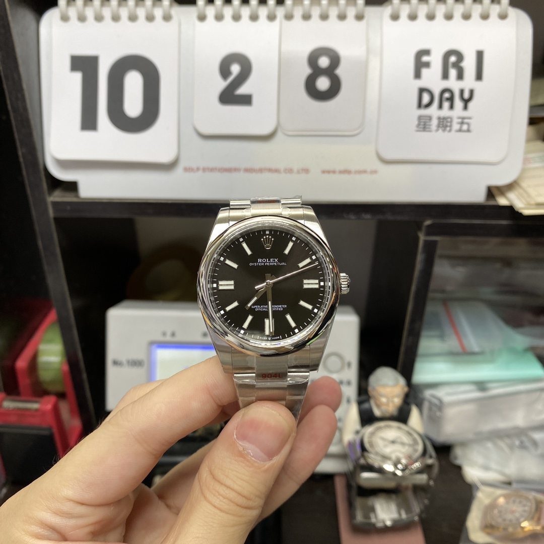 Rolex Oyster Perpetual series m124300-0002, Black Dial with Stick Indexes, 41mm size.