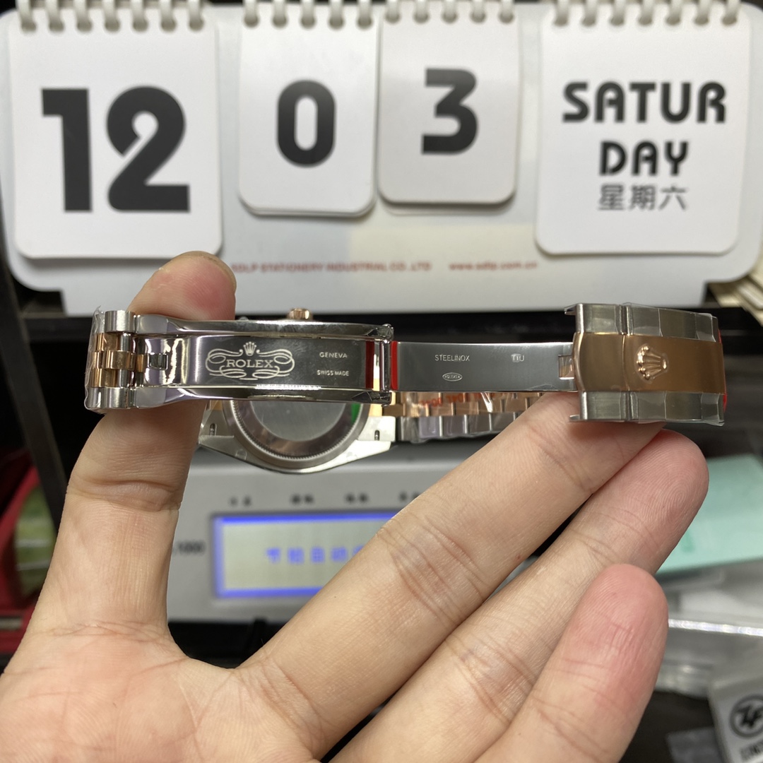 Rolex Datejust Series m126331-0008, Pink Dial with Checkered Bezel Two-Tone Rose Gold Case, 36mm Size, Five-Link Steel Bracelet.